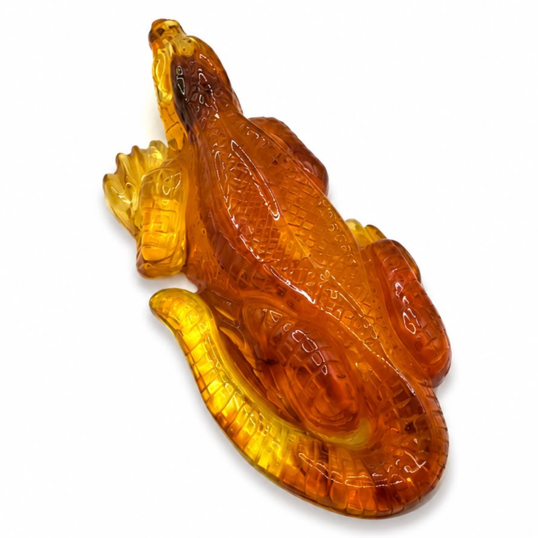 Honey and cognac Baltic amber lizard figurine, alternate view