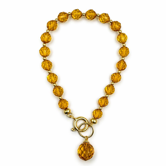 Gold-plated bracelet with faceted amber