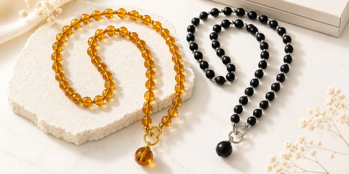 Baltic amber necklaces in cognac and black colors handcrafted in Lithuania