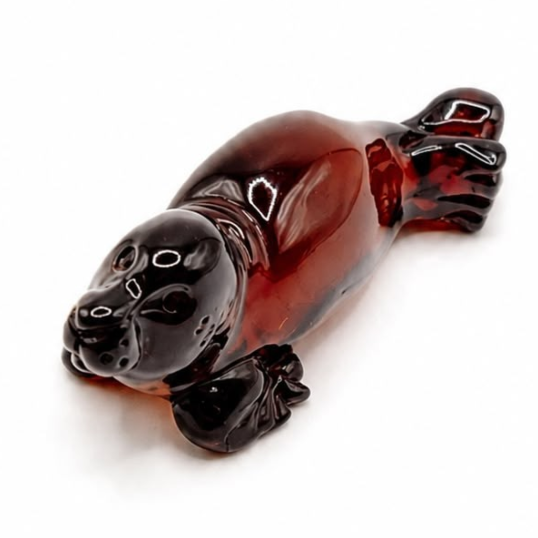 Cognac Baltic amber seal figurine