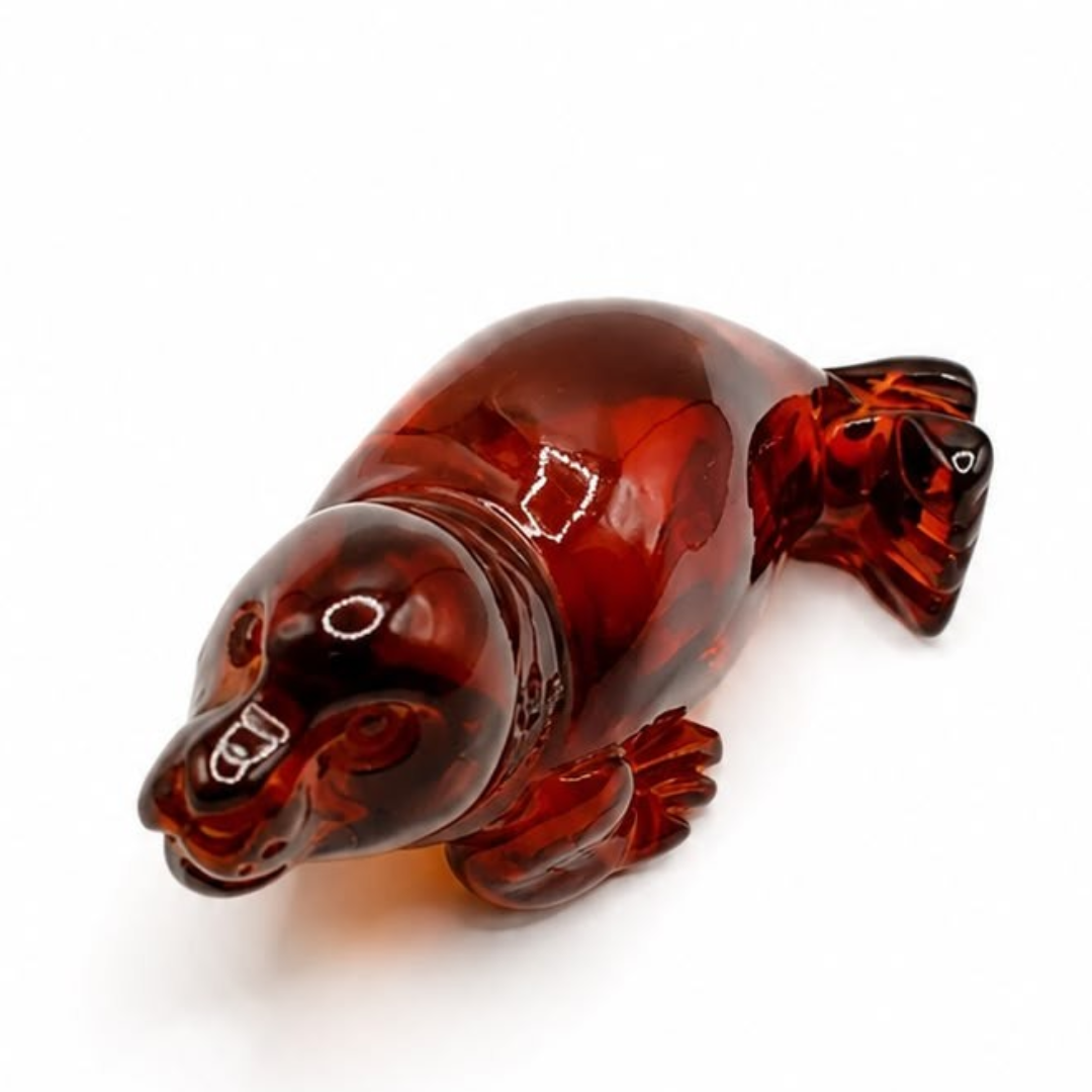 Cognac Baltic amber seal figurine