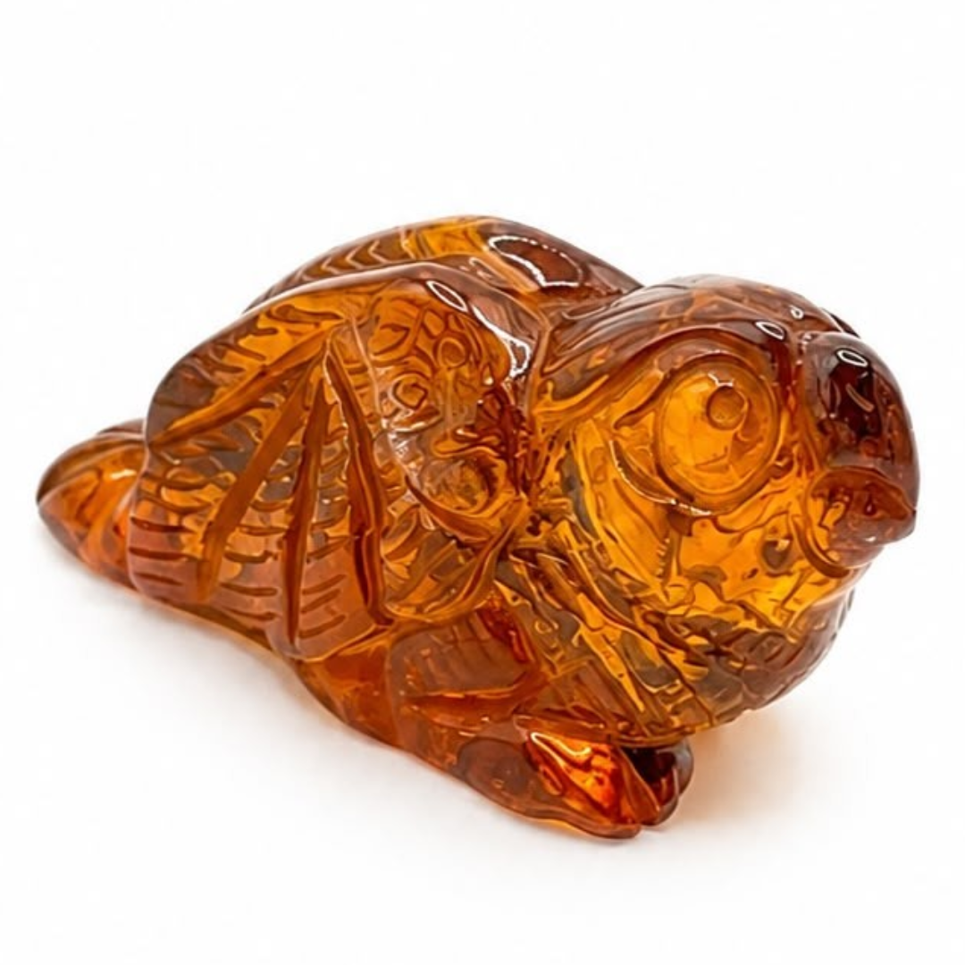 Honey and cognac Baltic amber bird figurine