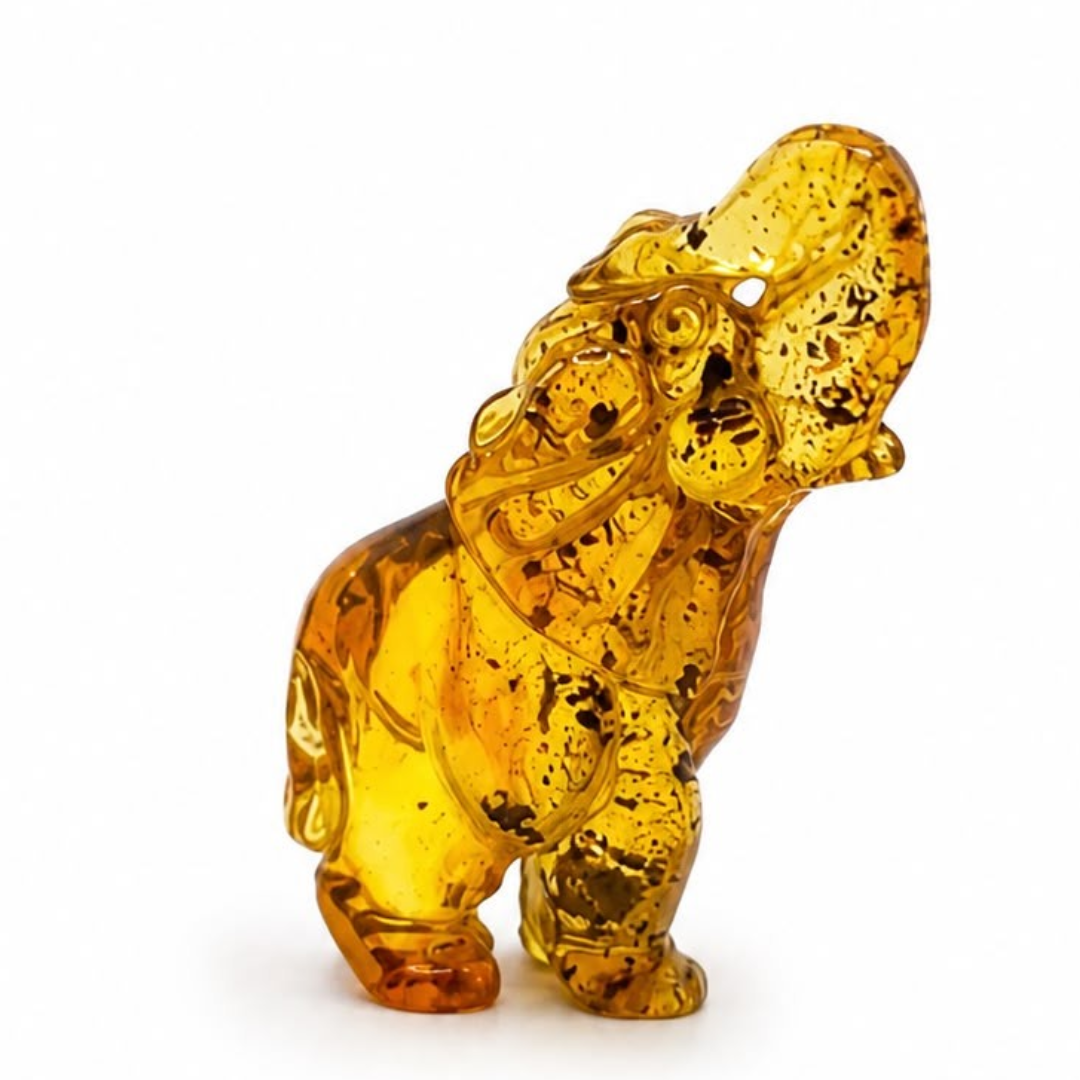 Green and honey Baltic amber elephant figurine